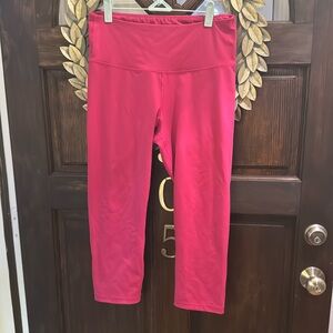 Barely worn leggings. High rise with go dry tech. A darker hot pink color, L